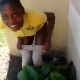 A black girl takes a shit by the side of a house and is video-recorded by her friend. She wipes her ass with notebook paper. No poop action is really visible, but the finished product is clearly seen.